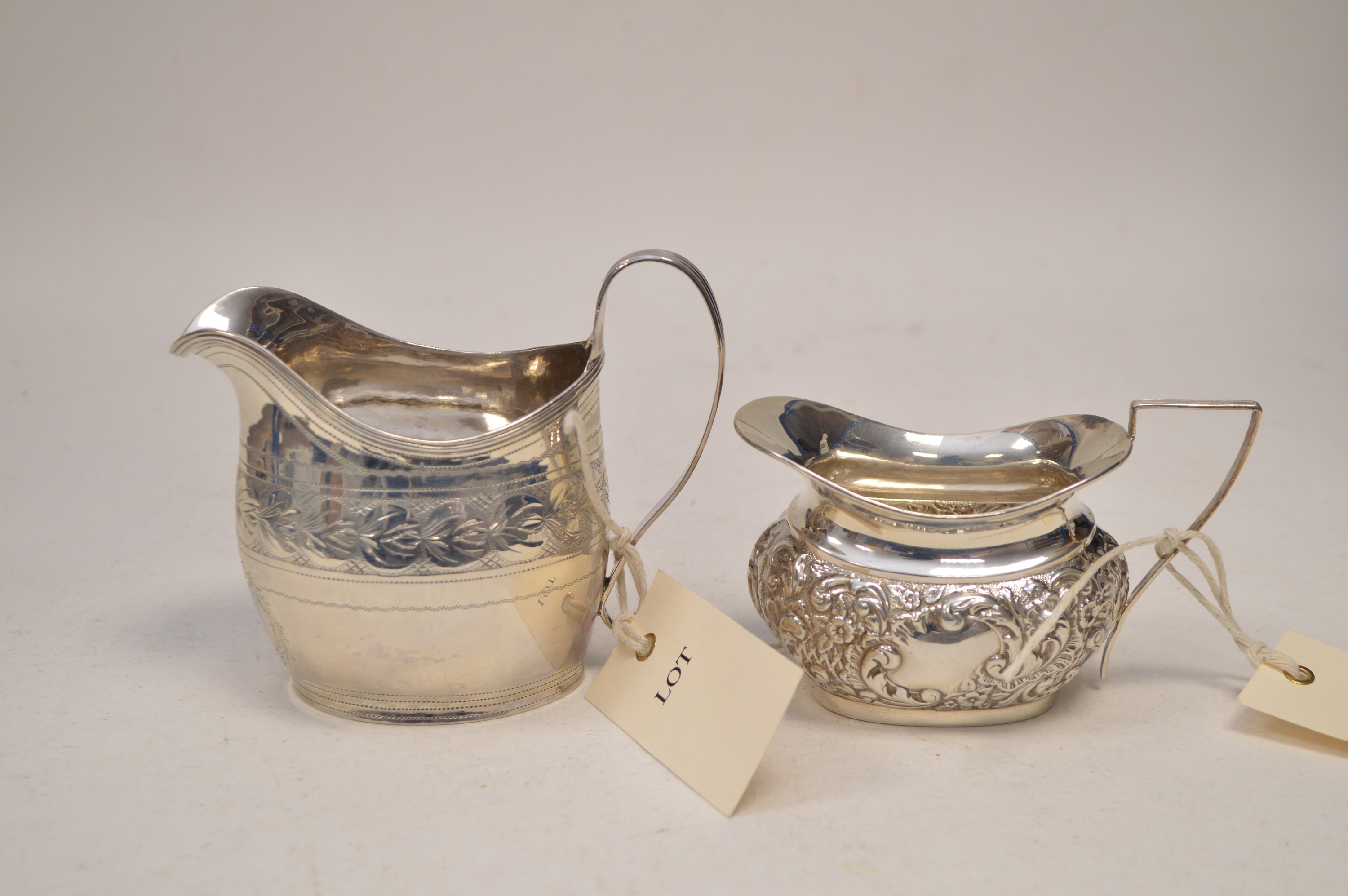 Two silver jugs