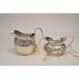 Two silver jugs