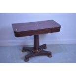 Mahogany swivel top games table.