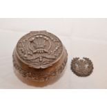 White metal military box and cap badge