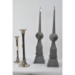 Pair of obelisk style ornaments; and two 'Manilow' pattern candle stands.