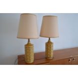 A pair of mid Century pottery geometric pattern table lamps.