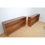 A pair of mid Century teak open bookcases.