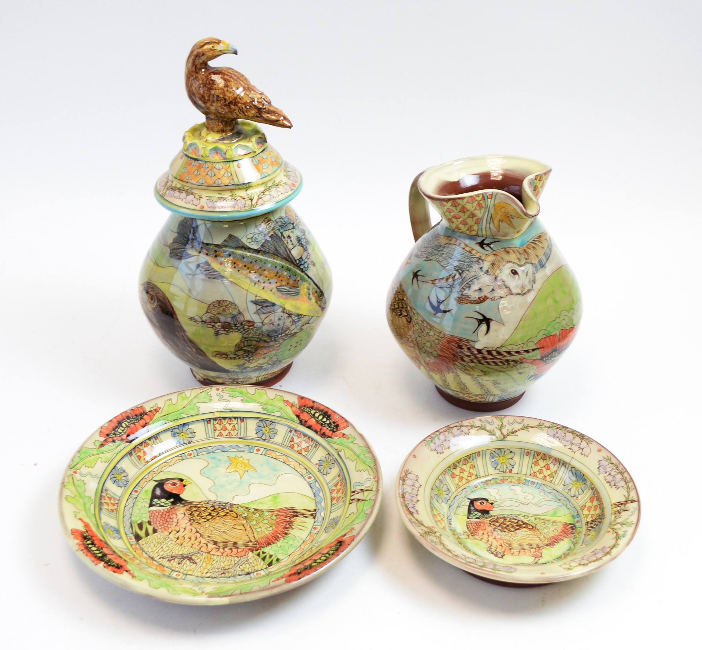 Group of studio animal decorated pottery