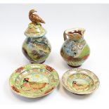 Group of studio animal decorated pottery
