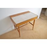 A mid 20th Century side table/desk.