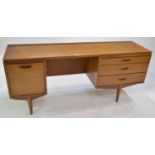 A Mid 20th C kneehole dressing table/side unit.