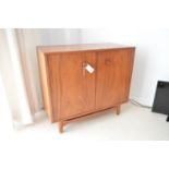 Mid Century chest of drawers; similar cabinet; wardrobe, and hi-fi unit.