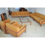 A 1960's teak and Harris Tweed modular lounge suite.