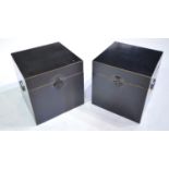 Pair of modern Chinese ebonised two-handled boxes.