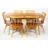 Ercol - Grand Windsor extending dining table and six Ercol Shalstone dining chairs