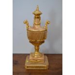 Modern ornate onyx and gilt metal urn style ornament.