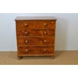 Victorian stained pine chest of drawers.