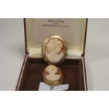 Two cameo brooches.