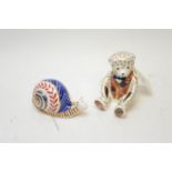 Two Royal Crown Derby paperweights.