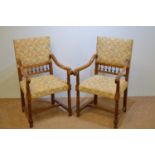 Pair of carved walnut armchairs in the 17th C style.