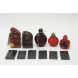 Chinese soapstone seals; snuff bottles; and green hardstone tiles.