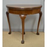 20th C mahogany turnover top card table.