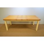 A modern oak top farmhouse table.