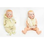 Two Armand Marseille bisque head dolls.