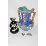 Majolica four-handled vase; and two glass vases.