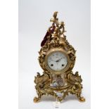 A modern French style Mozer mantel clock.