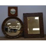 Two mirrors and a picture in oak frames.