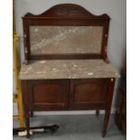 An early 20th C mahogany washstand.