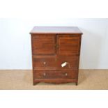 19th C mahogany and satin banded commode.