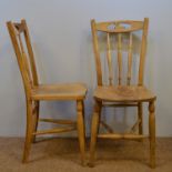 A pair of early 20th C oak occasional chairs.