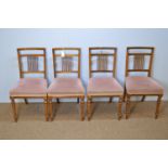 Four Edwardian walnut salon chairs.