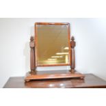 A Victorian mahogany swing framed toilet mirror, with rectangular plate between two fluted