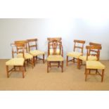 Seven 19th Century fruitwood dining chairs; and another.