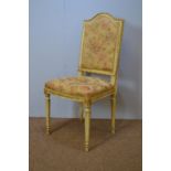 Cream and gold salon chair.