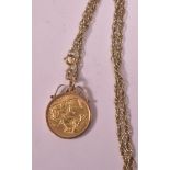 Gold sovereign pendant on chain