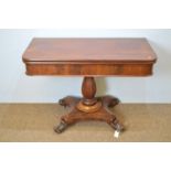 A Victorian mahogany tea table, the hinged swivel action top above plain frieze, on octagonal