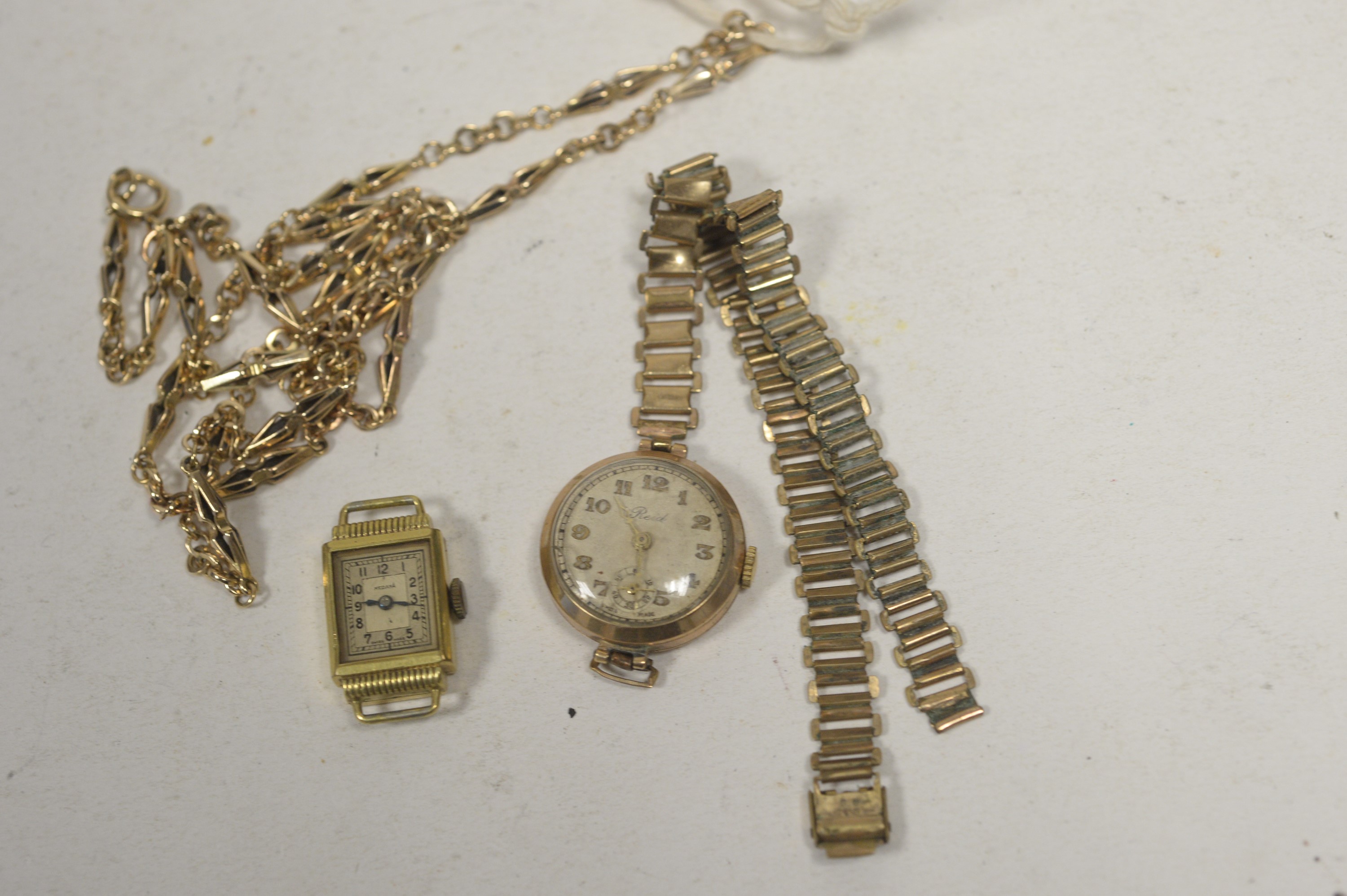 A yellow metal fancy link chain; and two watches.