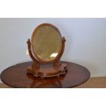 Victorian oval swing framed toilet mirror.