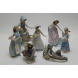 Seven Lladro figurines.