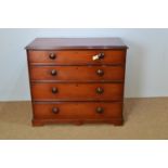Mahogany and ebonised chest of drawers.