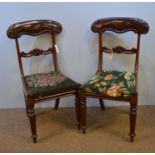 A pair of early 19th C mahogany chairs.