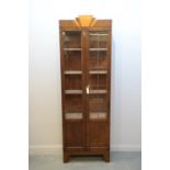 An Art Deco oak display cabinet