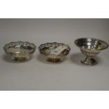 A pair of silver bon bon dishes; and another.