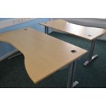 Office Dispersal Auction: Four maple effect desks.