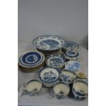 Blue and white teaware and plates.