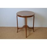 Edwardian mahogany circular two-tier table.