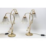 A pair of Art Nouveau style table lamps.