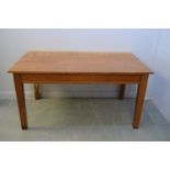 A 20th Century oak dining table