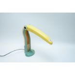 a Huangslite novelty toucan pattern folding table lamp