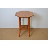 An Edwardian walnut octagonal two-tier occasional table, 49 x 69cms high.